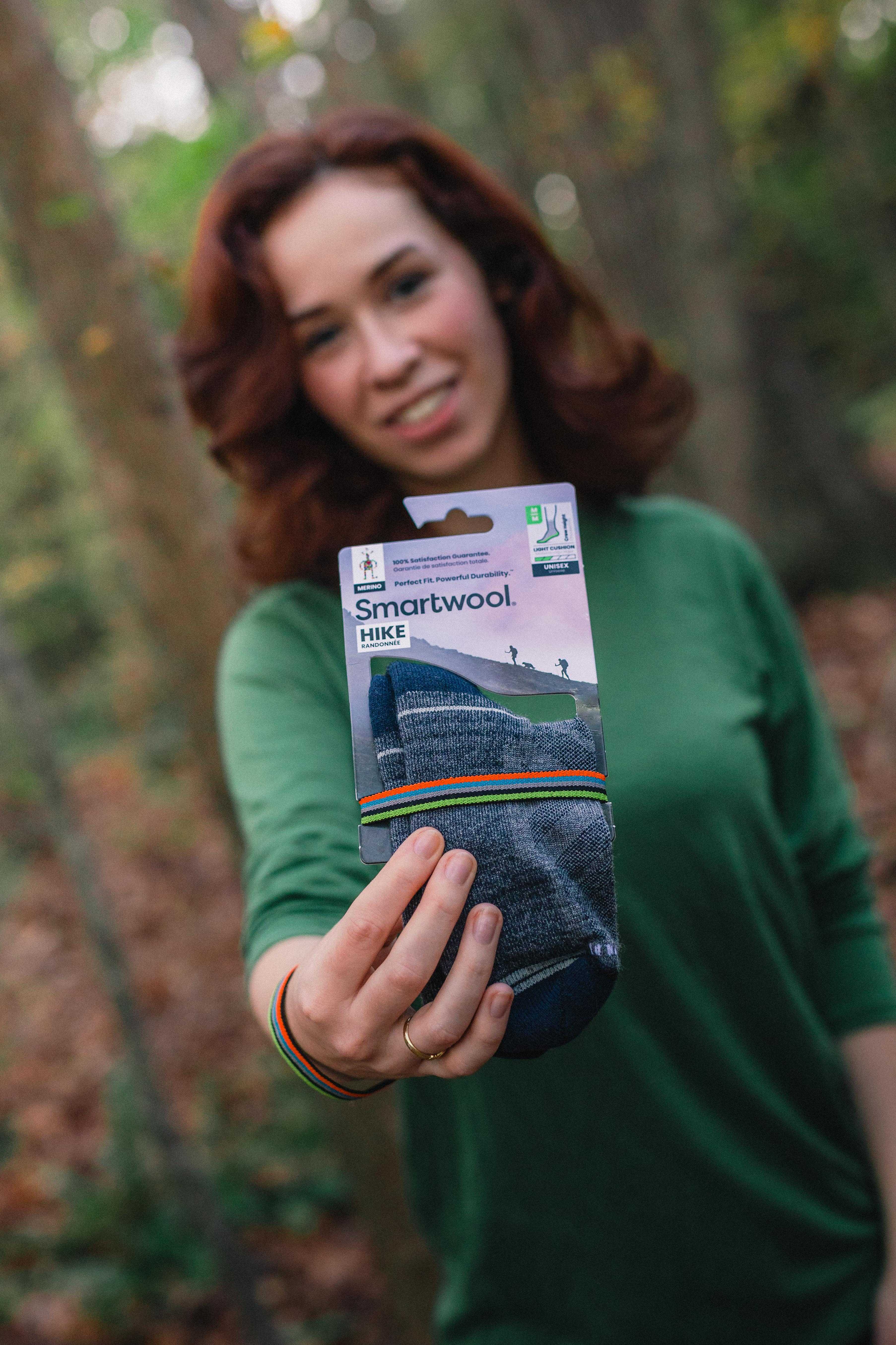 lifestyle holding smartwool socks.jpg